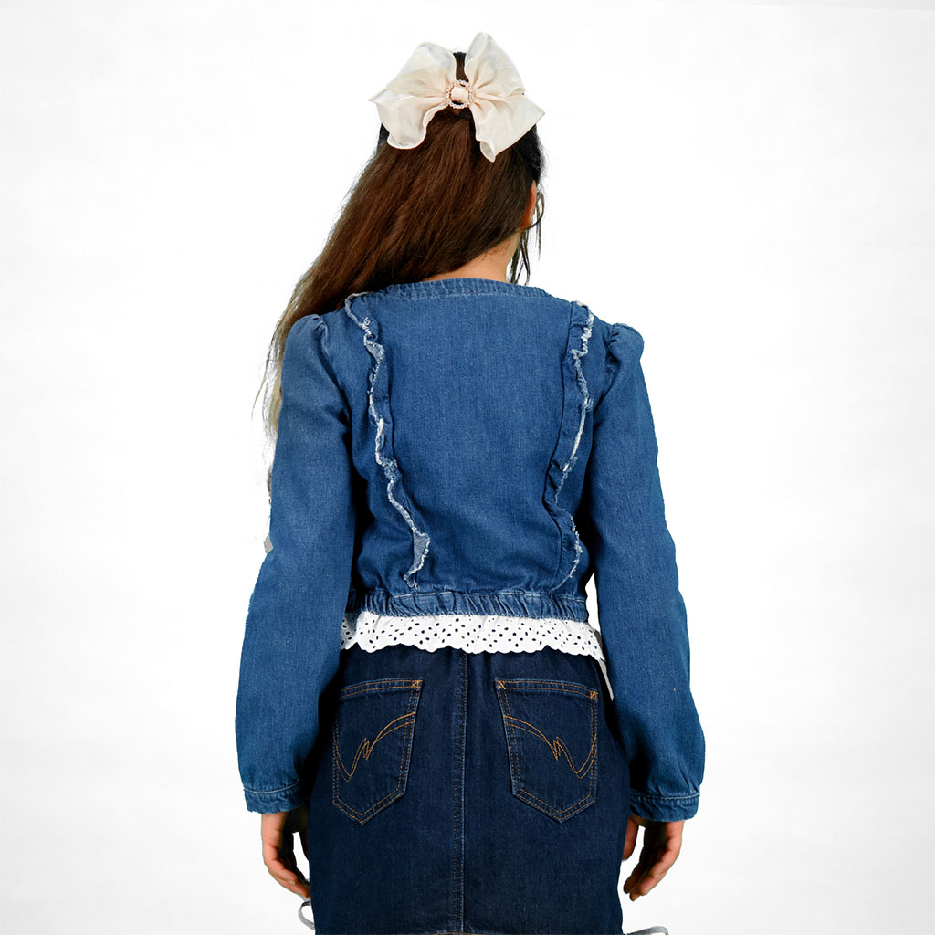 Blouse fille boutonnée avec volant et broderie anglaise